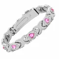 Dames magnetische therapie armband in zilveren tint met roze hartvormige kristallen - Gekruist Hart - Roze Strass / Zilver
