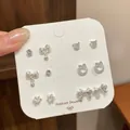Elegant six-piece silver earring set with delicate bow and heart stud designs for daily wear - Full Loop Bow Style (BMW1)