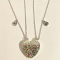 Macro view of split heart magnetic BFF necklaces featuring colorful glitter filling - Colorful Sequin Heart Puzzle Style (#12)
