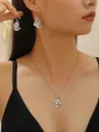 Vintage silver-tone cowboy hat pendant necklace and earrings set worn by model - Cowboy Hat Necklace & Earrings Set (18)