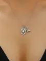 Vintage Western cowboy necklace featuring detailed silver boot and hat pendant charms - Cowboy Hat & Boot Charm Necklace (DZ-418)