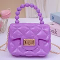 Modische lila Mini-Umhängetasche aus Jelly-Material mit Perlengriff und goldener Kette - Lila
