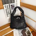 Detailed view of a black hand-woven mesh bag featuring hollow cotton rope design - Black (With Inner Bag)