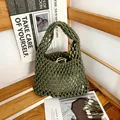 Detailed close-up of a handmade woven cotton rope mesh bag ideal for beach vacation styling - Army Green (With Inner Bag)