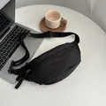 Premium minimalist black nylon waist bag for sport, outdoor travel and daily commuting. - Black