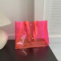 Sac fourre-tout en gelée rose fluo transparent avec anses oranges pour l'été chic - Rose rosé