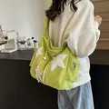 Green corduroy tote bag with white star patches shown on a shoulder for daily use - Corduroy Star Bag (088) / Lime Green (No Pendant)