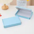 Light blue rigid mailing box for packaging in a clean lifestyle setting - 20*13*3cm / Blue