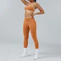 Seamless orange yoga set with white trim, including sports bra and high waist leggings. - XS / Top And Bottom / Camisole Bra Pumpkin + Pants Pumpkin