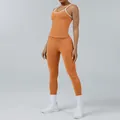 Seamless orange yoga set for women featuring ribbed workout top and high waist leggings - XS / Top And Bottom / Pumpkin Color Vest + Pumpkin Color Long Pants