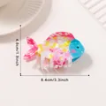 Vibrant tropical fish hair claw clip featuring pink and yellow patterned design - Candy Petal Fish
