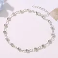 Elegant silver-toned anklet adorned with shimmering clear round crystals for beachwear - Rhinestone Tennis Chain (7197) / White K / Silver