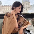 Vintage leopard print cotton linen shawl scarf for women in a Parisian cafe setting - Dark Brown