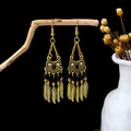 Vintage gold-plated ethnic style hollow tassel earrings with leaf charms and black beads - Hollow Semicircle Black Feather Tassel Style (E5987-3)