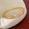 Elegant gold plated bamboo style bangle with sparkling stones in new Chinese design - Zirconia Bamboo Style / Gold