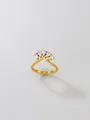 Detail view of golden stainless steel ring with pear-shaped cubic zirconia crown - Size 6 / 18K Gold