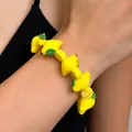 Handmade fresh yellow resin lemon fruit bracelet featuring vibrant leaf and slice charms - Lemon Beaded Bracelet (4870)