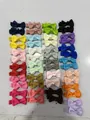 Set de pinzas para el cabello con lazos de cinta de falla para niñas, varios colores - Estilo 50D (50 piezas)