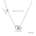 Collana in acciaio inossidabile 316L con doppio pendente a quadrifoglio in finitura argento - Stile Quadrifoglio Traforato a Doppio Anello (81624) / 40+5cm / Argento