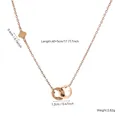 Rose gold stainless steel double ring necklace with a delicate clover charm detail. - Double Ring Hollow Clover Style (81625)