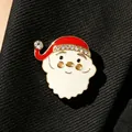 Cute Santa Claus enamel brooch with sparkling rhinestones pinned on black fabric - Santa Claus