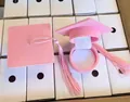 Elegant pink flocked graduation cap shaped jewelry box with silk tassel for gifts - 60*60*39mm / Pink