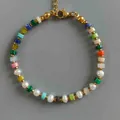 Vibrant rainbow abacus bead and white pearl necklace featuring a gold-tone lobster clasp - Multicolor Disc Pearl Bracelet (17+3cm)