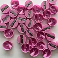 Batch of pink mini round manual pencil sharpeners on white background - Pink