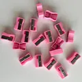 Bulk pack of mini pink plastic single-hole pencil sharpeners for school and office. - Rectangular Pink