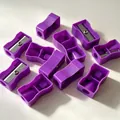 Group of mini purple manual plastic pencil sharpeners with single hole for school students - Rectangular Purple
