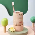 Lindo vaso de enjuague bucal de dinosaurio rosa para niños con cepillo de dientes suave - 301-400ml / Taza de Dinosaurio Rosa
