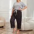 Plus size women's loungewear set featuring grey short sleeve top and heart print pajama pants - 1XL / Top And Bottom / Gray
