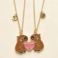 Cute cartoon capybara magnetic heart necklaces for best friends with gold BFF charms. - Double Heart Capybara Necklace / Gold