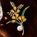 Detailed macro shot of an elegant wheat brooch with yellow crystals and white pearl accent - Harvest Wheat Ear (Golden Yellow) / Gold Yellow