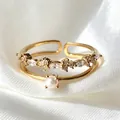 Verstellbarer Ring in Gold-Optik mit Marquise-Zirkonia und einer eleganten weißen Perle. - Einstellbar Offen / Doppelschichtig Zirkonia und Künstliche Perle Stil (JZ091) / Gold