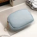Small light blue pebbled leather coin purse featuring a sturdy zipper and gold keychain - Zipper Coin Purse (407) / Blue