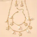Ensemble de bijoux étoile de mer et coquillage doré avec collier et bracelet - Ensemble de bijoux / Blanc