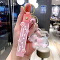 Creative pink cherry blossom quicksand keychain with acrylic flower and dried petals - Pink