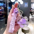 Beautiful purple cherry blossom acrylic keychain with real dried petals and liquid glitter - Purple