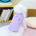 Detailed view of the purple padded dog vest with cute embroidered patches - S / Purple