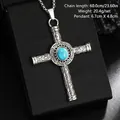 Macro detail of vintage titanium steel cross pendant with turquoise stone centerpiece - Turquoise Cross Necklace (08463) / Chain Length 60cm / Vintage Silver (Blue Stone Texture)