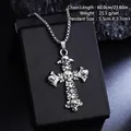 Macro detail of a vintage skull cross pendant necklace in distressed silver finish - Five-Skull Cross Necklace (08469) / Chain Length 60cm / Retro Silver (Skull)