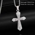 Macro detail of a silver-toned titanium steel cross pendant with inlaid rhinestones - Rhinestone Cross Necklace (08482) / Chain Length 70cm / Vintage Silver (Pave)