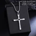 Macro detail of a titanium steel cross pendant necklace with inlaid rhinestones. - Articulated Cross Necklace (08487) / Chain Length 60cm / Vintage Silver (Pave)