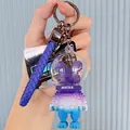 Cute space series cat keychain featuring pixelated mecha design and blue braided strap. - ABC Blocks Bear / Purple