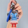 Trendy blue and red pixelated mecha cat astronaut keychain with a blue braided strap - ABC Blocks Bear / Blue