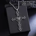 Retro gothic titanium steel cross pendant necklace displayed on a black jewelry box - Hollow Heart Cross Necklace (08486) / Chain Length 60cm / Antique Silver