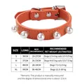 Elegant orange PU leather pet collar with pearl studs and comprehensive size chart guide - Orange