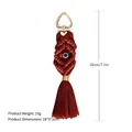 Handmade bohemian tassel keychain with heart clasp and evil eye charm in brown - Brown