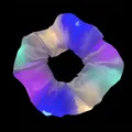 Close-up of white LED glowing hair scrunchie with blue and purple lights for rave party accessory. - LED Glowing Style / White